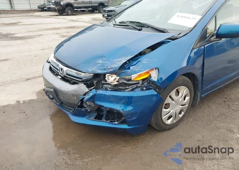 2012 Honda Insight Lx from USA, damaged, VIN JHMZE2H52CS003381